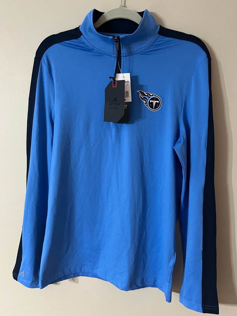 Antigua Tennessee Titans NFL 1/4 zip pullover Women’s size Small Blue